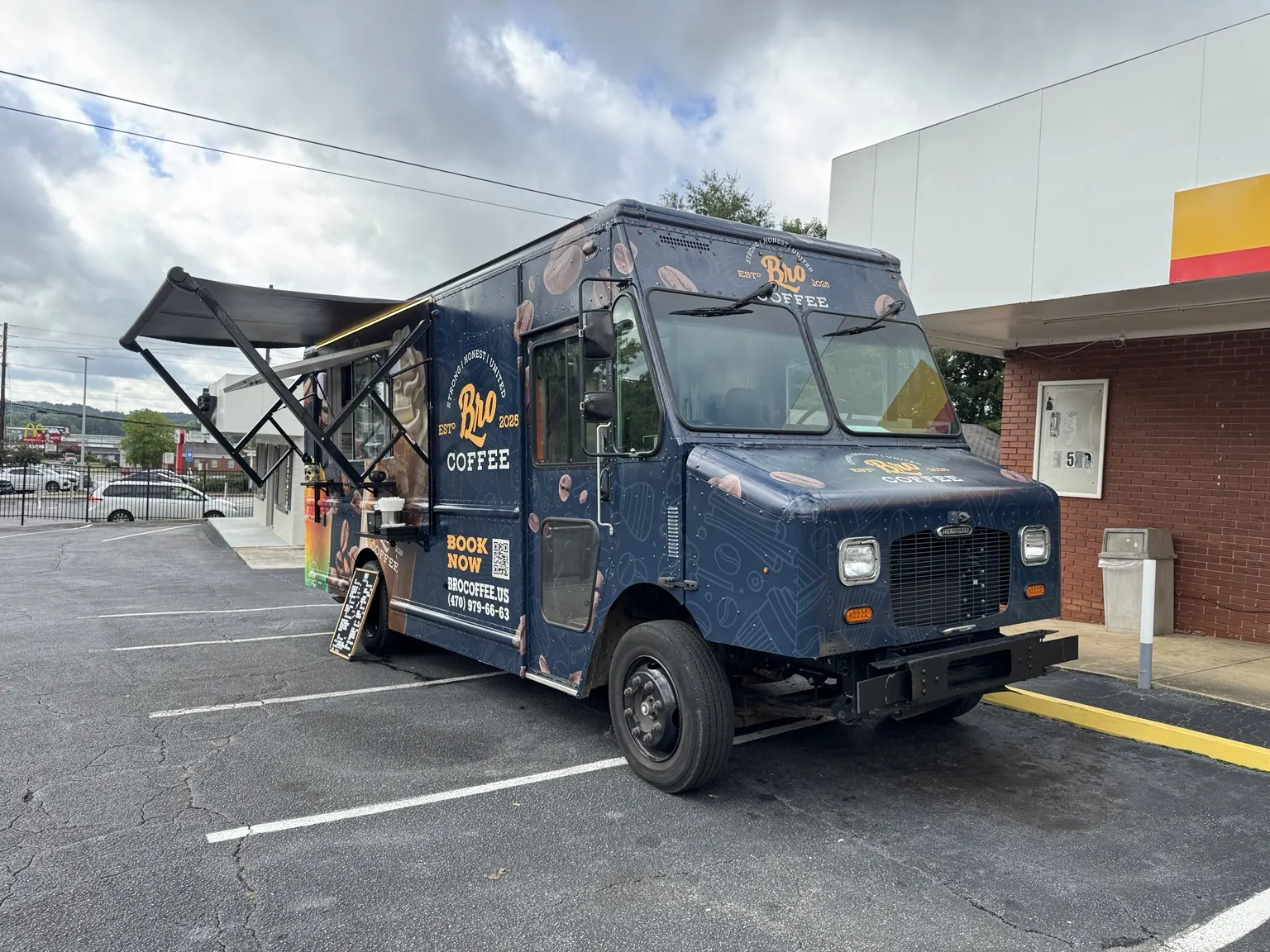 Completed Bro Coffee step van with service window and exterior branding